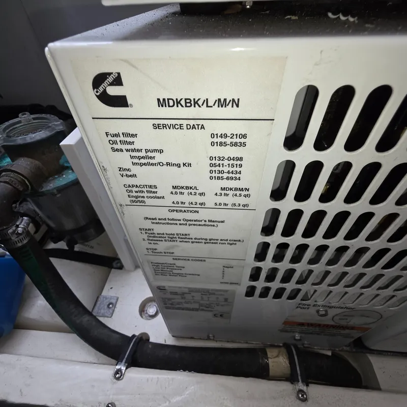 Slide: The Image of Cummins engine service data label on a 2013 Zeelander Z44 yacht. - 46