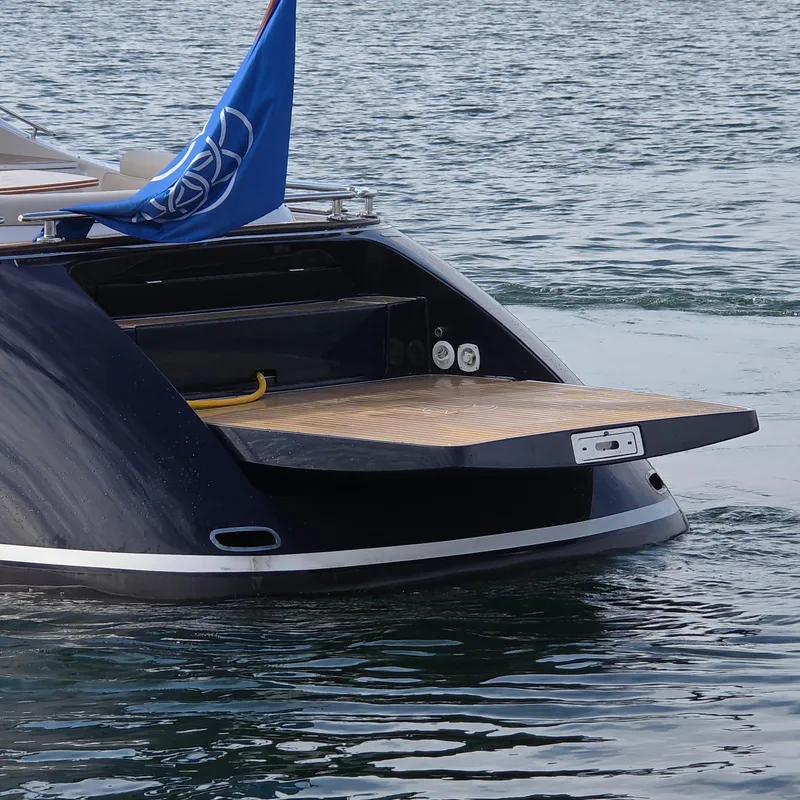 Slide: The Image of 2013 Zeelander Z44 yacht with open swim platform on calm water. - 8