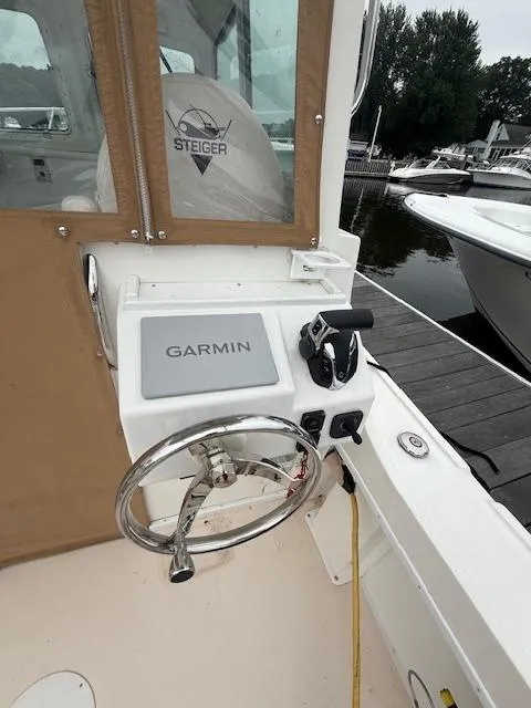 Slide: The Image of Steiger Craft 255 DV MIAMI 2021 boat helm with Garmin navigation system at dock. - 7