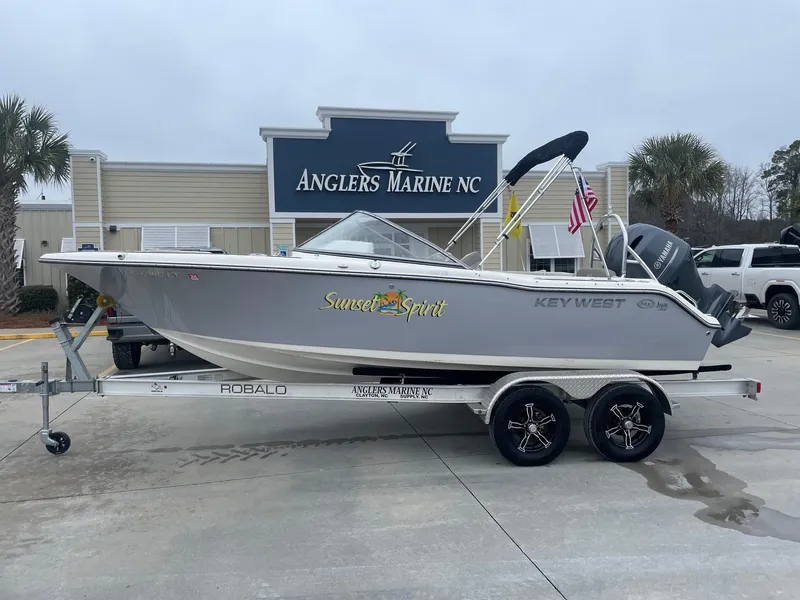Slide: The Image of 2021 Key West 203 DFS boat on trailer at Anglers Marine NC dealership. - 0