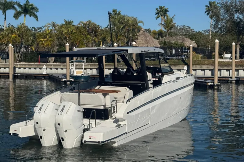 Slide: The Image of 2026 Beneteau Gran Turismo 35 yacht docked, featuring twin Mercury V10 engines. - 15
