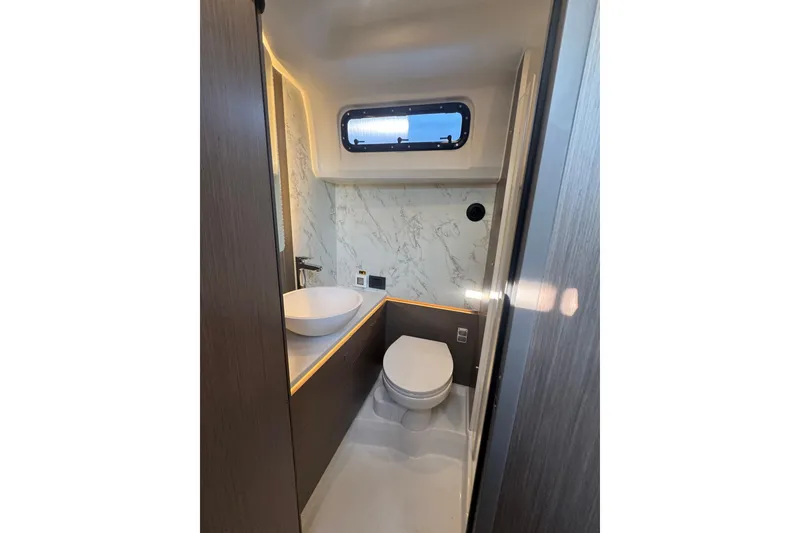 Slide: The Image of Modern bathroom in 2026 Beneteau Gran Turismo 35 yacht with sleek design and elegant fixtures. - 25