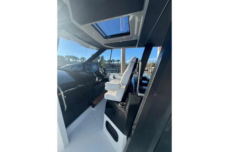 Slide: The Image of Interior view of 2026 Beneteau Gran Turismo 35 yacht cockpit with modern design. - 28