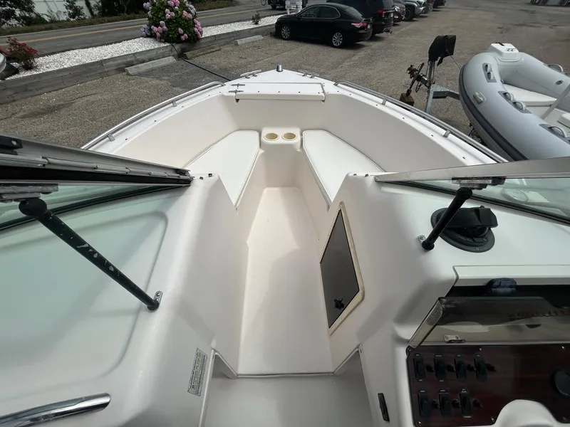 Slide: The Image of 1999 Grady-White 192 Tournament boat interior with seating and control panel. - 11