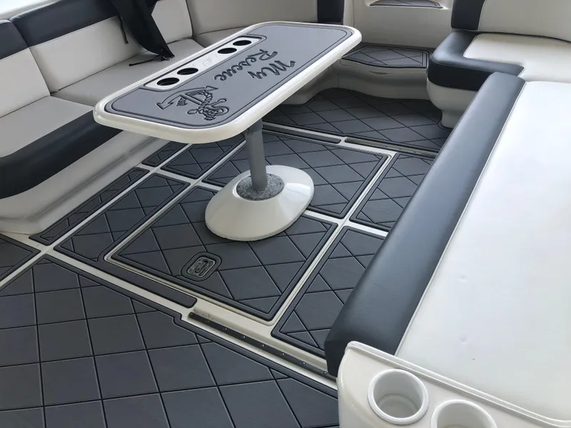 Slide: The Image of Interior of 1999 Sea Ray 460 Sundancer yacht with seating and table. - 10