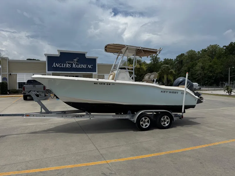 The Image of 2019 Key West 219 FS boat on trailer at Anglers Marine NC dealership. - 0