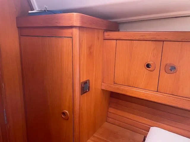 Slide: The Image of Interior of 2004 Wauquiez Centurion 40s yacht with wooden cabinetry and storage. - 15