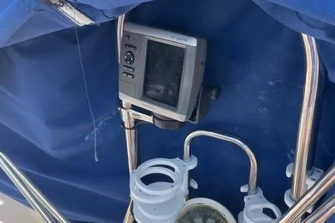 Slide: The Image of 2004 Wauquiez Centurion 40s yacht cockpit with navigation equipment and compass. - 21