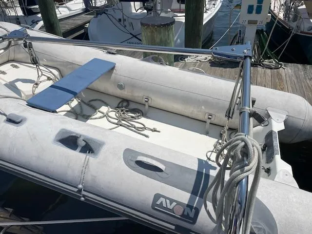 Slide: The Image of Inflatable boat docked near a 2004 Wauquiez Centurion 40s yacht. - 26
