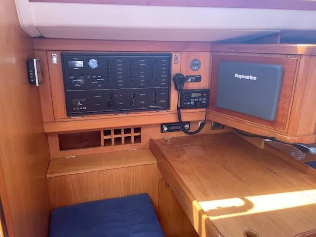 Slide: The Image of Navigation station of 2004 Wauquiez Centurion 40s yacht with control panel and Raymarine equipment. - 5
