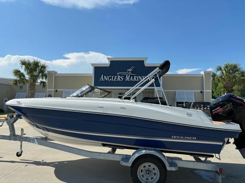 Slide: The Image of 2021 Bayliner VR4 Bowrider OB on trailer at Anglers Marine dealership. - 0