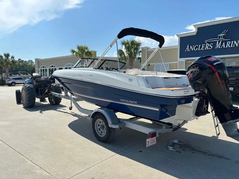 Slide: The Image of 2021 Bayliner VR4 Bowrider OB on trailer at Anglers Marine dealership. - 2