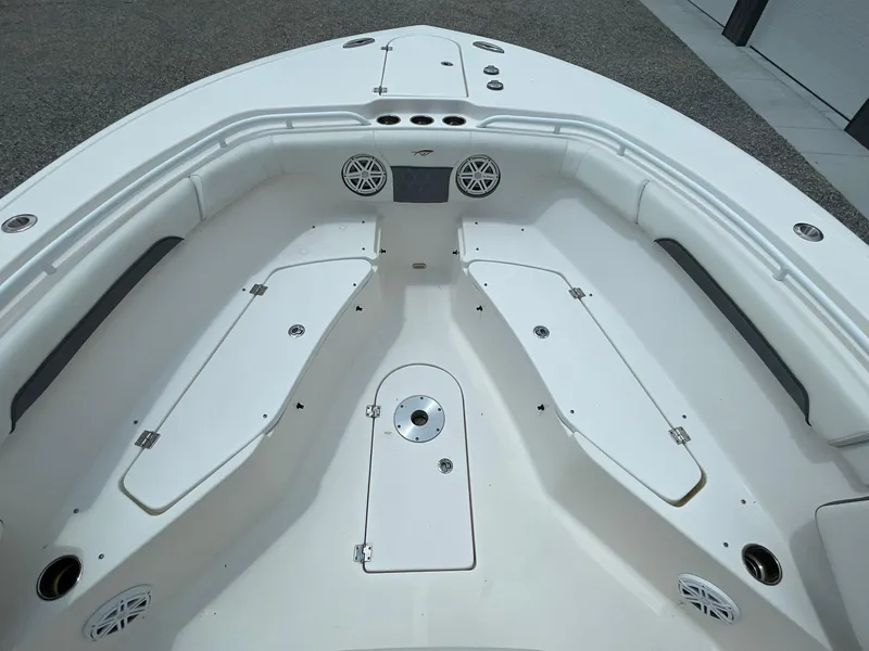 Slide: The Image of 2020 Tidewater 280 CC Adventure Custom boat interior, featuring spacious seating and storage compartments. - 11