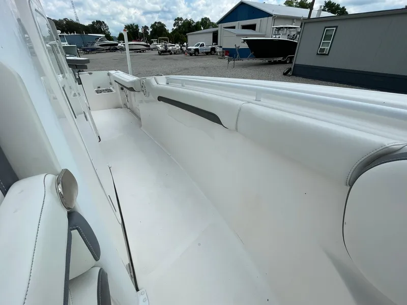 Slide: The Image of 2020 Tidewater 280 CC Adventure Custom boat interior, showcasing spacious seating and sleek design. - 16