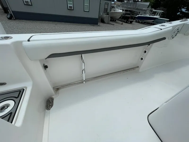Slide: The Image of 2020 Tidewater 280 CC Adventure Custom boat interior with white seating and storage area. - 35