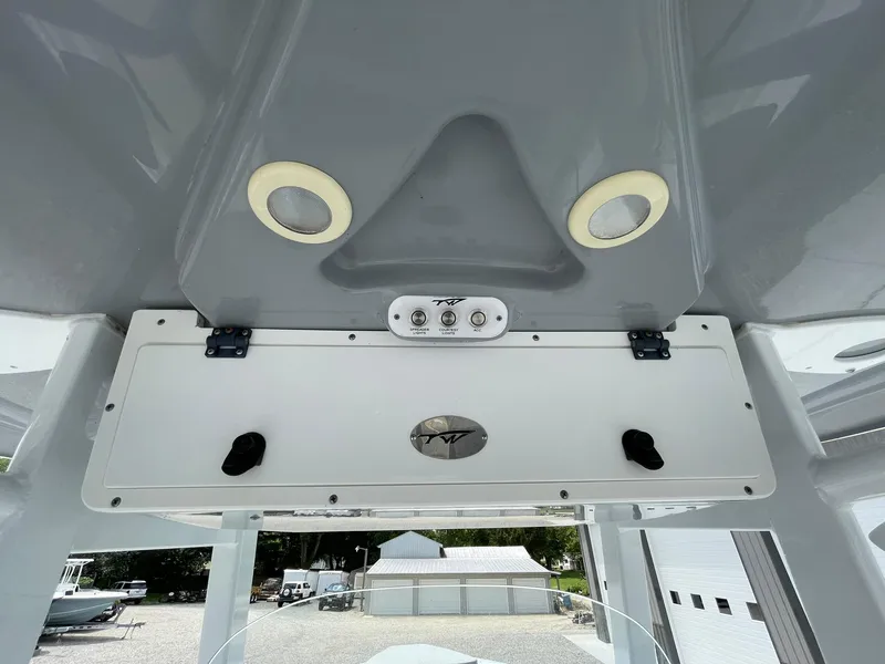 Slide: The Image of 2020 Tidewater 280 CC Adventure Custom boat console with controls and lighting. - 37