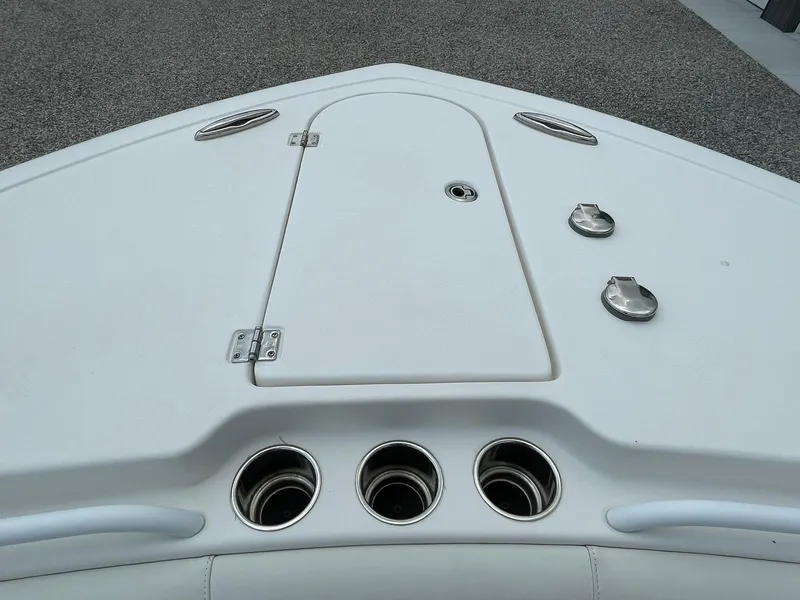 Slide: The Image of Bow of 2020 Tidewater 280 CC Adventure Custom boat with storage hatch and cup holders. - 4