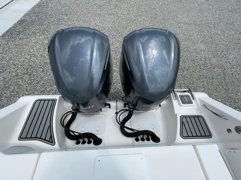 Slide: The Image of Twin outboard motors on a 2020 Tidewater 280 CC Adventure Custom boat. - 45