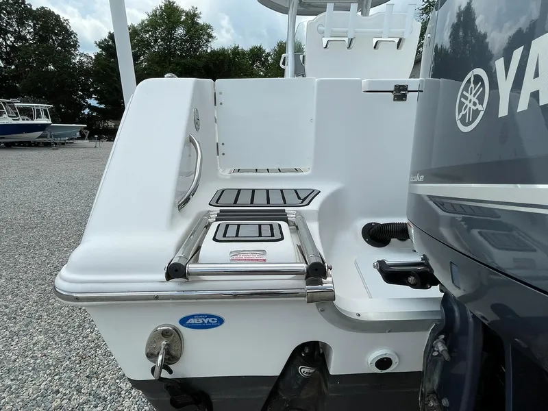 Slide: The Image of 2020 Tidewater 280 CC Adventure Custom boat with Yamaha engine, rear view. - 49