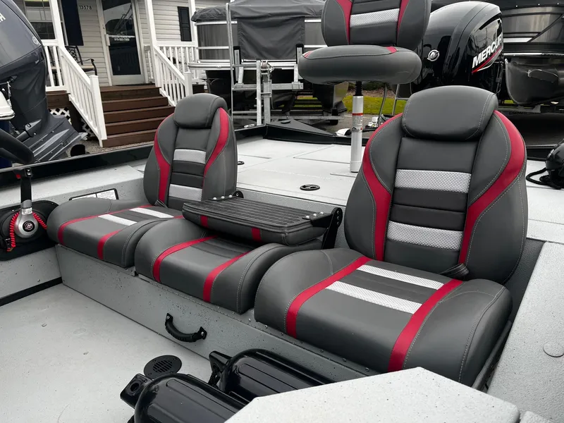 Slide: The Image of 2021 Ranger RT178 boat interior with gray and red seating, showcasing modern design and comfort. - 19