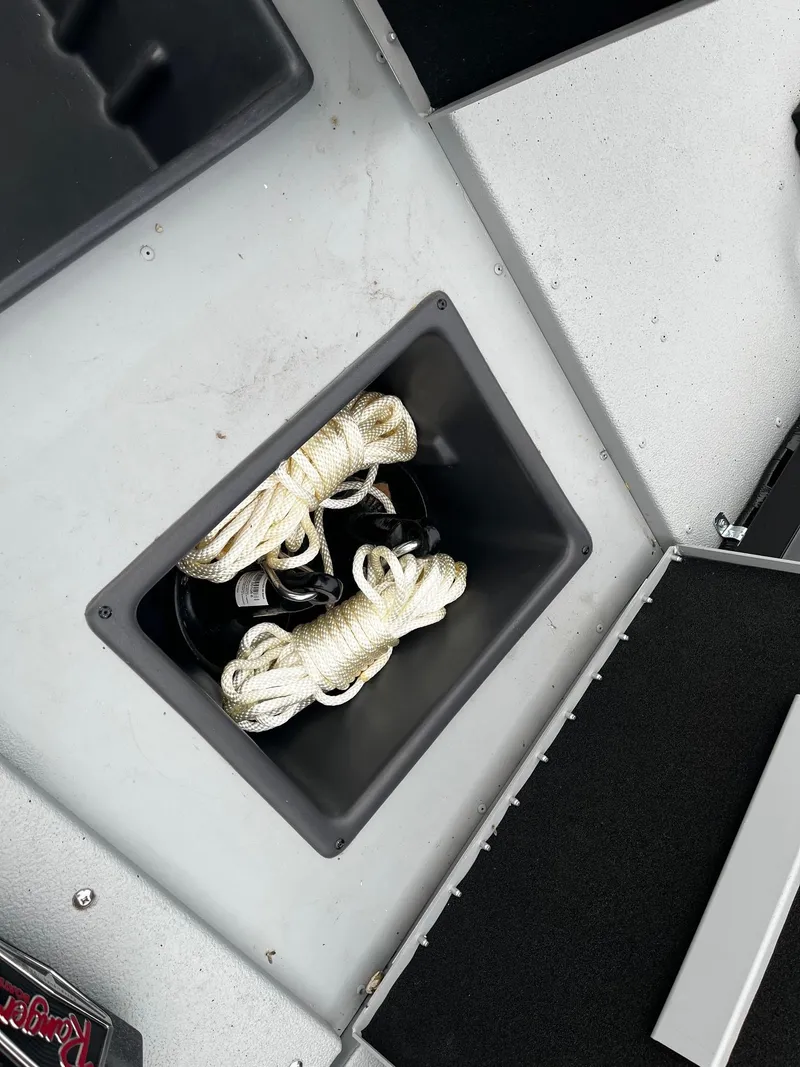 Slide: The Image of Storage compartment with ropes in a 2021 Ranger RT178 boat. - 7