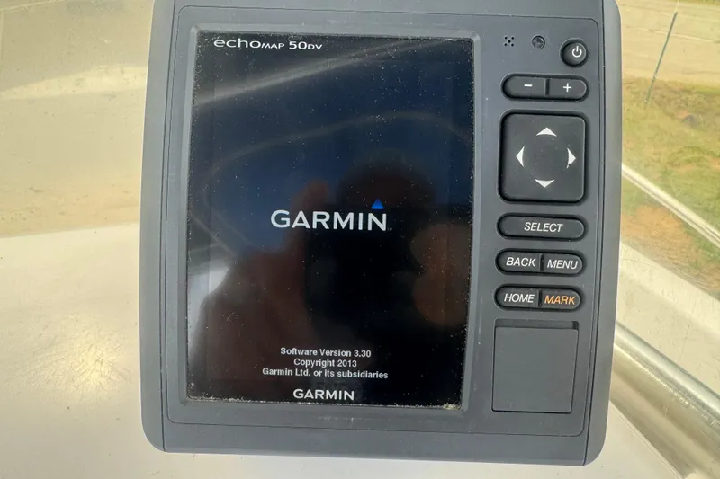 Slide: The Image of Garmin echoMAP 50dv on 2002 Pro-Line 20 Sport boat, displaying software version 3.30. - 10
