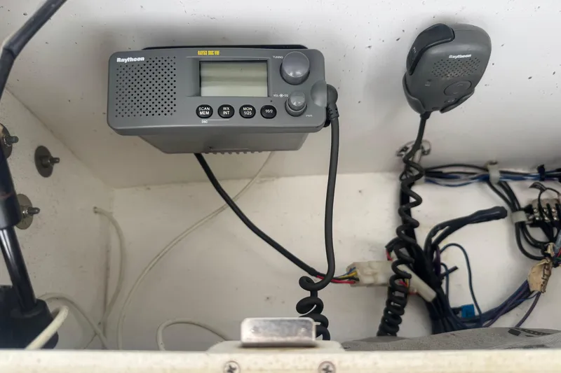 Slide: The Image of Raytheon marine radio and microphone in a 2002 Pro-Line 20 Sport boat. - 8
