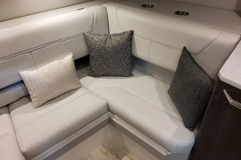 Slide: The Image of Luxurious seating area in 2026 Formula 380 Super Sport Crossover OB boat interior. - 115