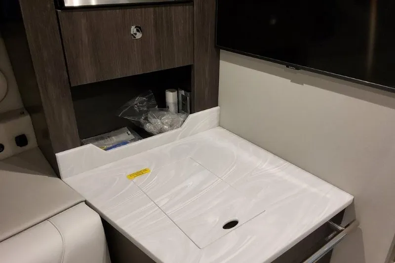 Slide: The Image of Interior of 2026 Formula 380 Super Sport Crossover OB with sleek countertop and storage. - 118