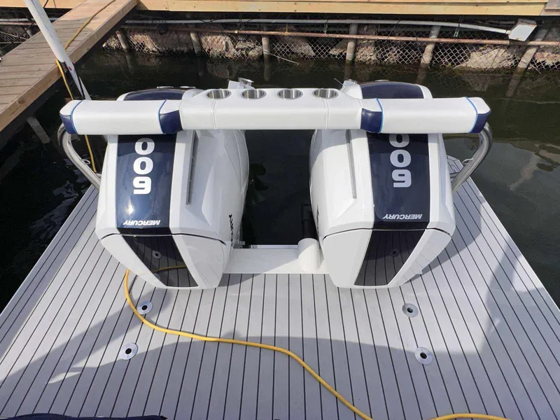 Slide: The Image of 2026 Formula 380 Super Sport Crossover OB boat in a showroom setting. - 3