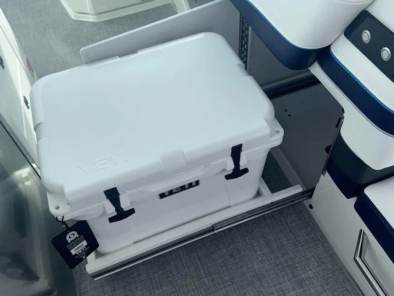 Slide: The Image of 2026 Formula 380 Super Sport Crossover OB with dual outboard motors in a garage setting. - 31