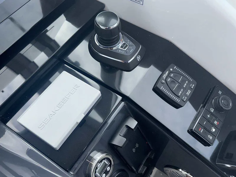 Slide: The Image of 2026 Formula 380 Super Sport Crossover OB interior with white seating and speakers. - 40