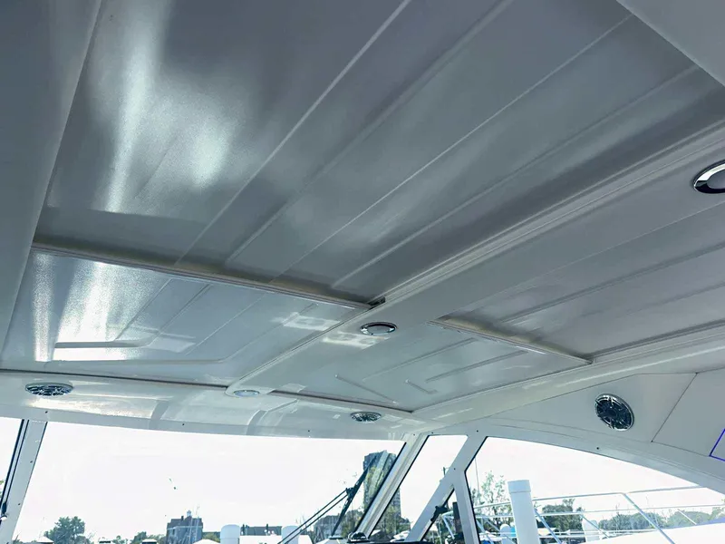 Slide: The Image of 2026 Formula 380 Super Sport Crossover OB boat interior with built-in storage compartment. - 46