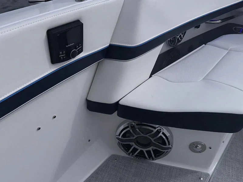 Slide: The Image of 2026 Formula 380 Super Sport Crossover OB boat interior with sleek design and cup holders. - 54