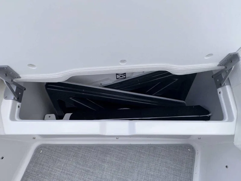 Slide: The Image of Interior of 2026 Formula 380 Super Sport Crossover OB boat with modern controls and seating. - 56