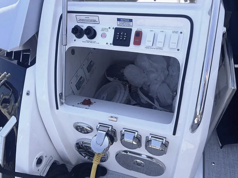 Slide: The Image of 2026 Formula 380 Super Sport Crossover OB boat, sleek design, indoor display. - 6