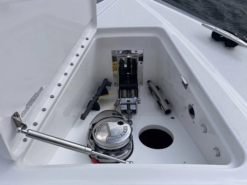 Slide: The Image of Interior view of 2026 Formula 380 Super Sport Crossover OB boat in a warehouse setting. - 60