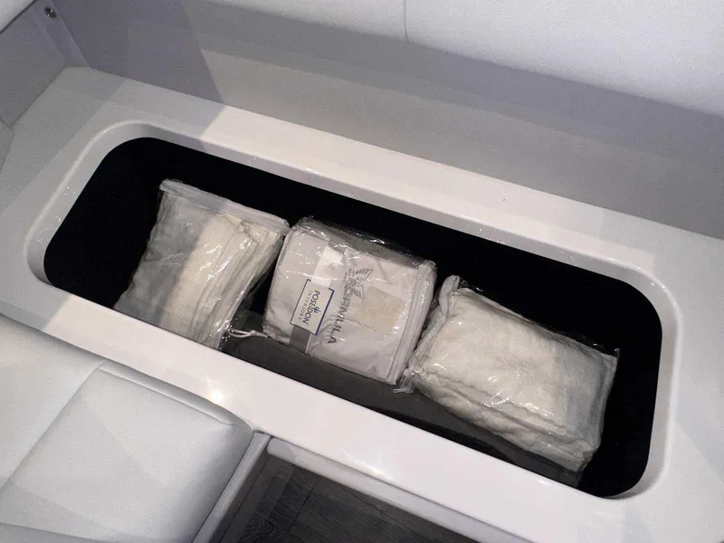 Slide: The Image of Drawer with multiple 1st Mate wearable fob kits on a Formula 380 Super Sport Crossover OB. - 68