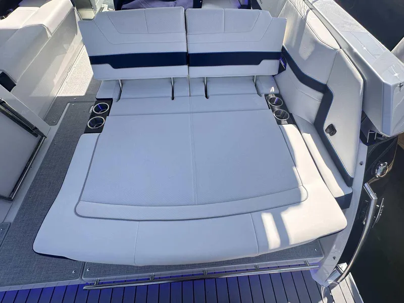 Slide: The Image of 2026 Formula 380 Super Sport Crossover OB in a showroom, showcasing sleek design. - 7