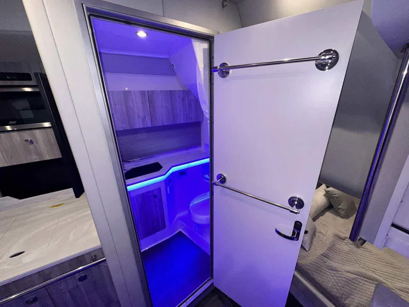 Slide: The Image of 2026 Formula 380 Super Sport Crossover OB interior seating and storage area. - 72