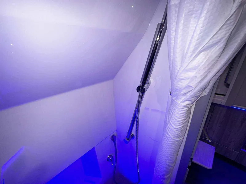 Slide: The Image of 2026 Formula 380 Super Sport Crossover OB interior with luxurious white seating and cup holders. - 75