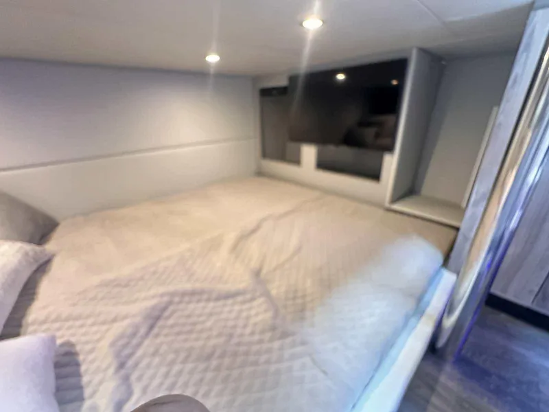 Slide: The Image of Storage compartments in a 2026 Formula 380 Super Sport Crossover OB boat. - 85