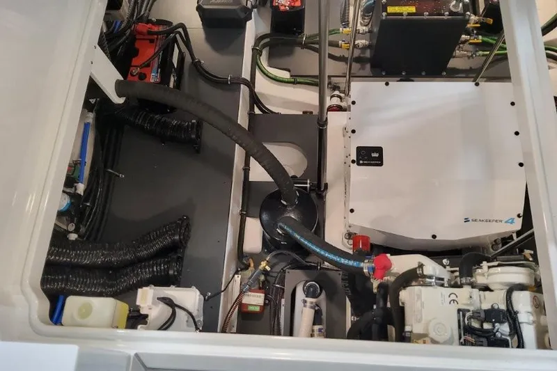 Slide: The Image of Engine compartment of 2026 Formula 380 Super Sport Crossover OB with Seakeeper 4 stabilizer. - 87