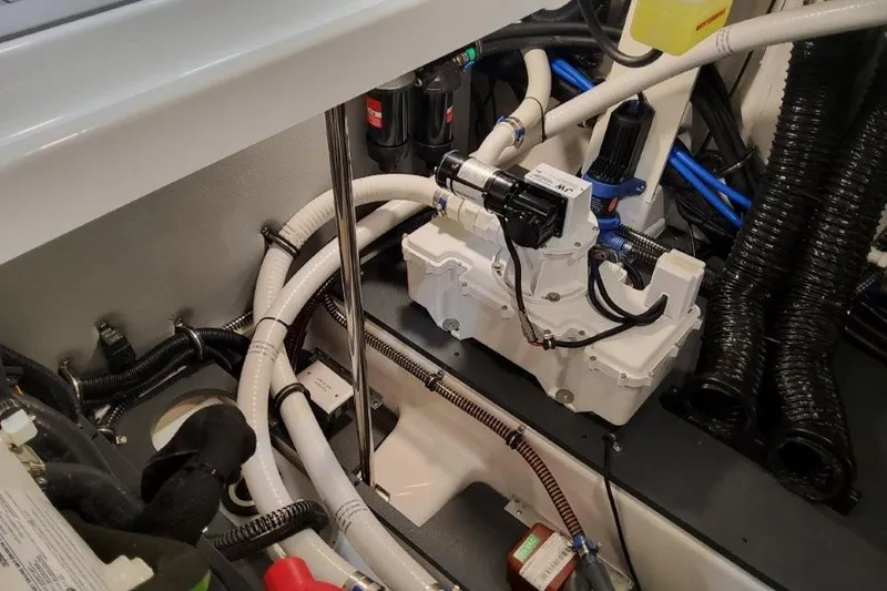 Slide: The Image of Engine compartment of 2026 Formula 380 Super Sport Crossover OB with visible wiring and components. - 91