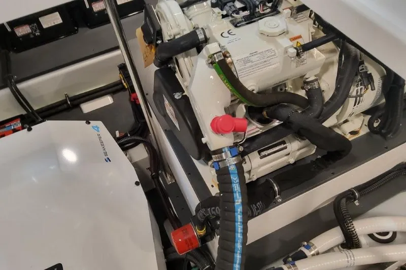 Slide: The Image of Engine compartment of 2026 Formula 380 Super Sport Crossover OB with visible components and wiring. - 94