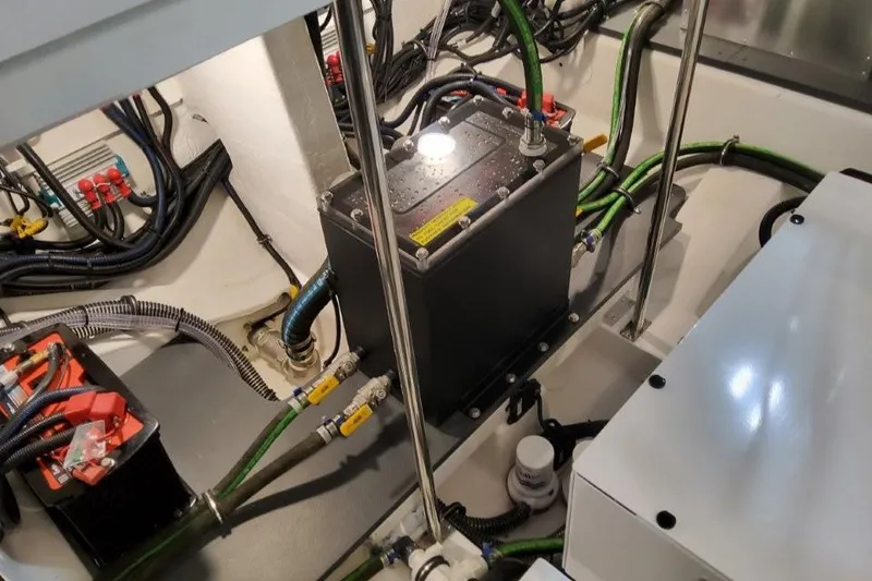 Slide: The Image of Engine compartment of 2026 Formula 380 Super Sport Crossover OB with wiring and components. - 95