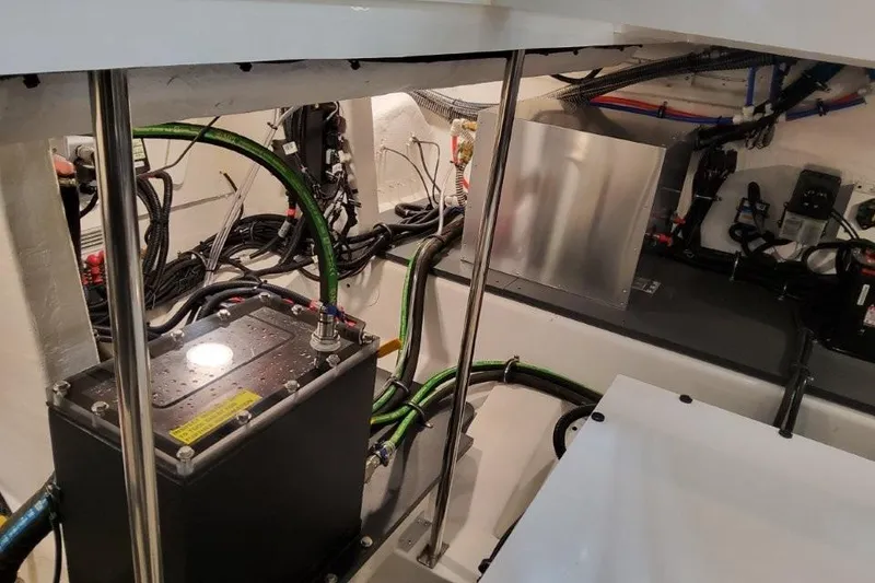 Slide: The Image of Engine compartment of 2026 Formula 380 Super Sport Crossover OB with wiring and components. - 96