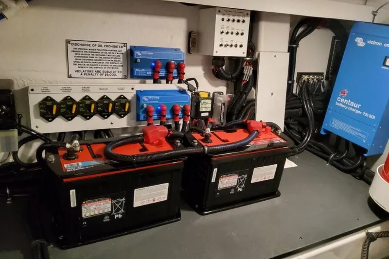Slide: The Image of Electrical system of 2026 Formula 380 Super Sport Crossover OB with batteries and wiring. - 99