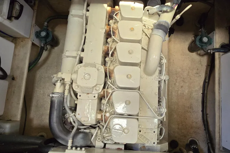 Slide: The Image of Engine compartment of a 2001 Nordic Tug 32, showcasing detailed mechanical components. - 37