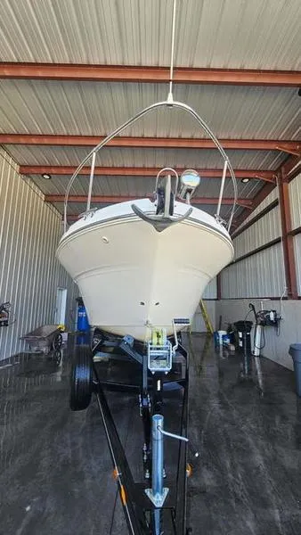 Slide: The Image of 1999 Sea Ray 270 boat on trailer in storage facility. - 8